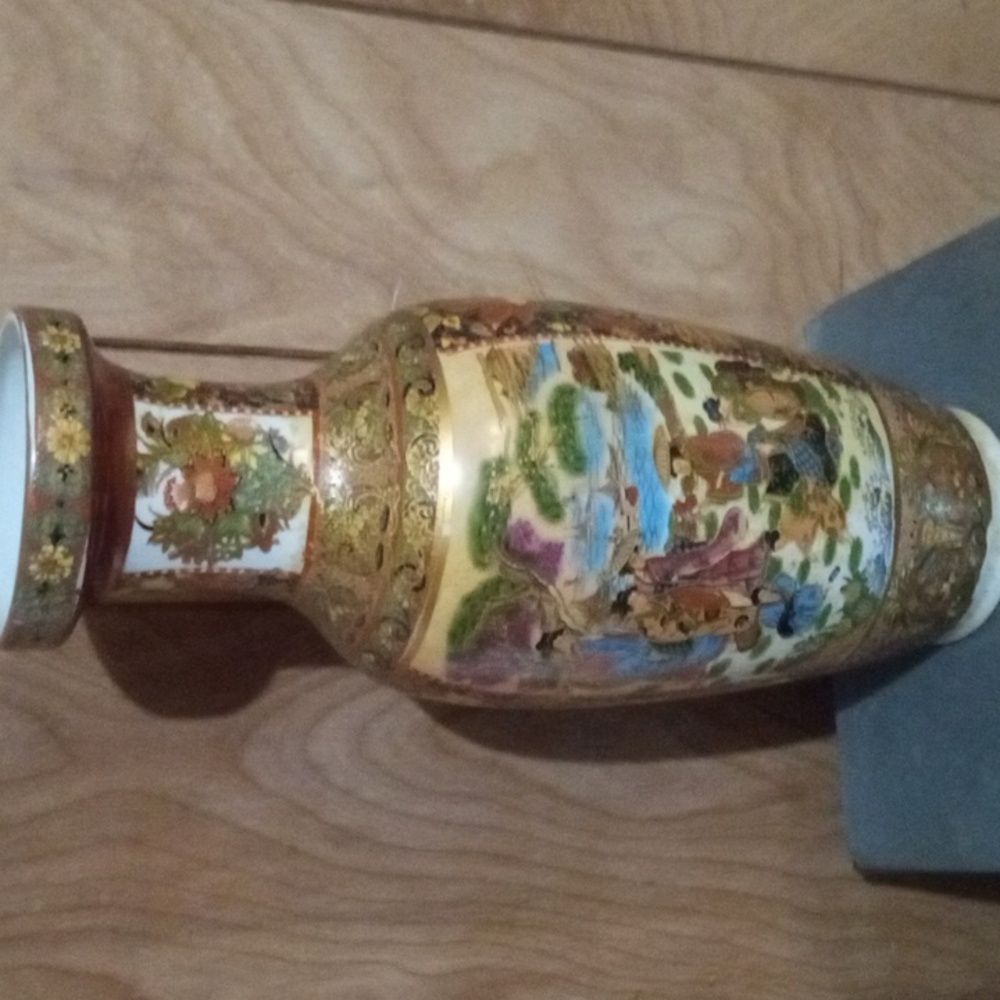 Japanese vase, multi colored with gloss overlay from the 1950's. Beautiful .